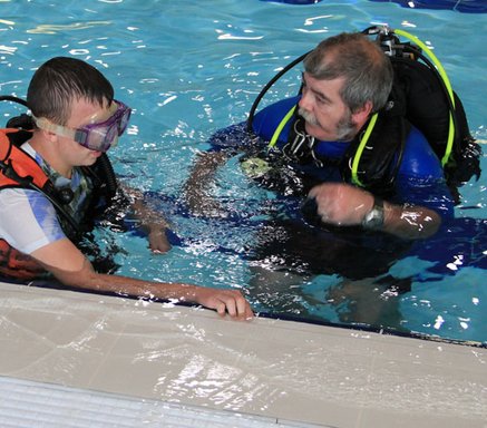 Student receives a breifing during a training session